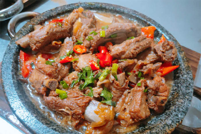 ʯ偲